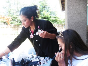 Photo by: Athena Skapinakis Dolores Ventura (left) searches for the correct shade of foundation as Danielle Alcala (right) tests out a different shade.